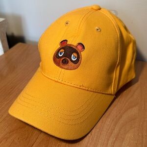 Yellow Culturefly Animal Crossing Tom Nook SnapBack hat